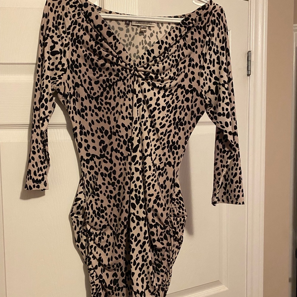 J Lo body hugging dress